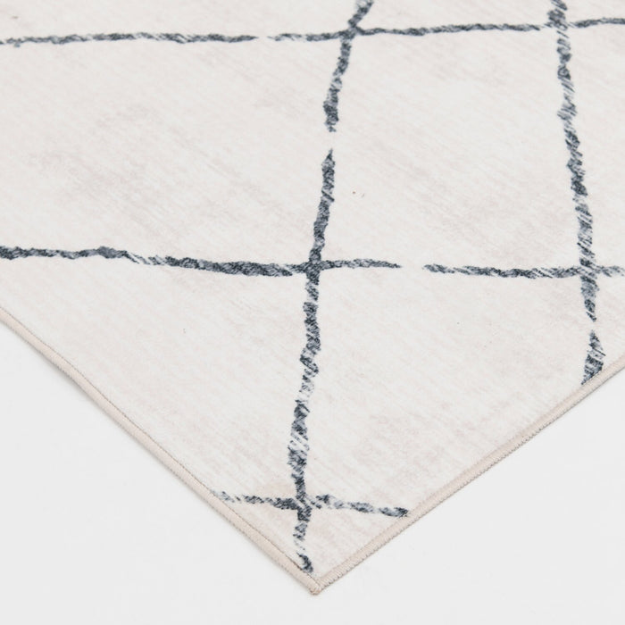 Selin Ivory Washable Area Rug - 5’ x 7’