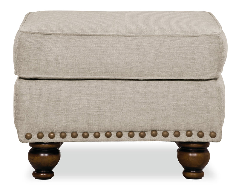 Made in Canada Wynn 24\" Chenille Fabric Ottoman with Nailhead Trim and Wood Bun Legs - Linen