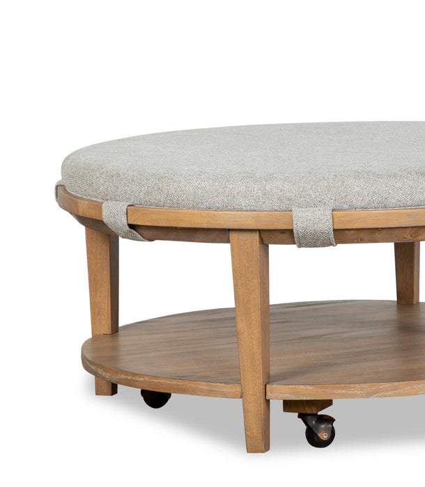 Rhett 38\" Modern Round Coffee Table with Shelf and Casters - Light Brown Wood with Grey Cushion