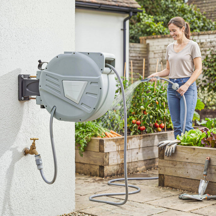 Outsunny Retractable Garden Hose Reel, 1/2\" x 98ft Wall Mounted Hose Reel with Auto Retraction, Self-Locking, Slow Return System, 180° Swivel Bracket and 2 Patterns Nozzle