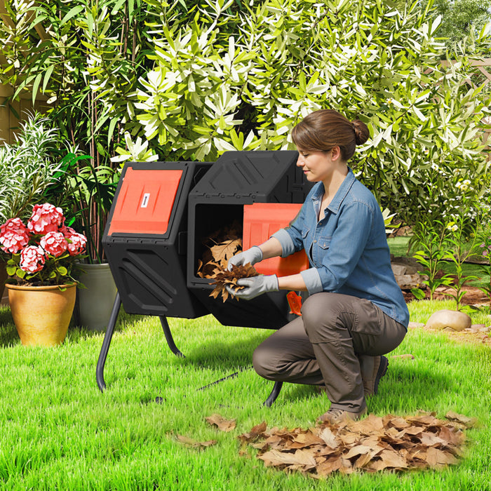 Outsunny 34.5 Gallon Dual Chamber Compost Bin, Rotating Composter, Compost Tumbler with 24 Ventilation Openings and Steel Legs, Orange