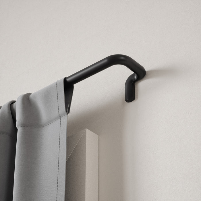 Umbra Twilight Matte Black Expandable Blackout 3/4\" Curtain Rod - 30\"-84\" 