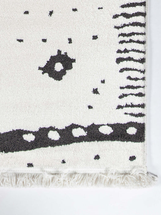 Lyra Contemporary 5'3\" x 7'2\" Area Rug in Ivory Indoor Area Rug