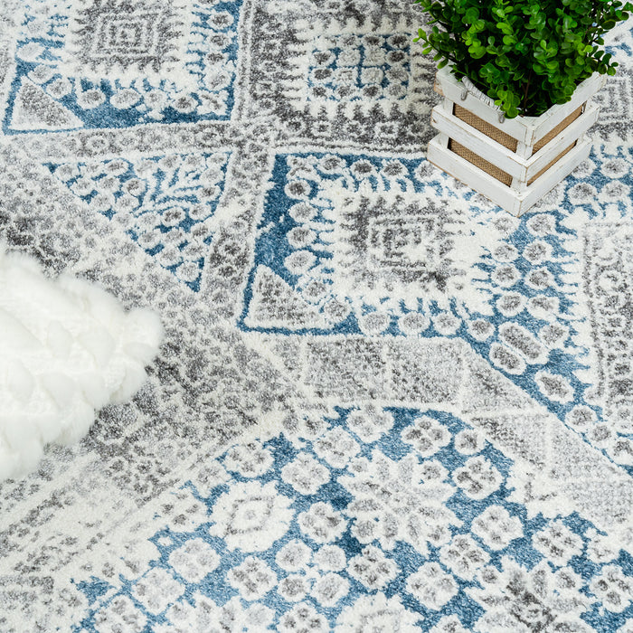 Darius Abstract Patch Blue Area Rug - 6'7\" x 9'6\"