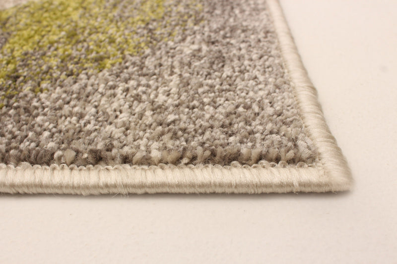 Korra Ivory / Green 6'7\" x 9'6\" Area Rug