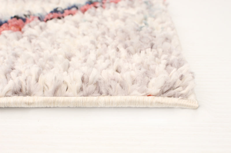 Makondo Abstract Ivory Area Rug - 6'7\" x 9'6\"