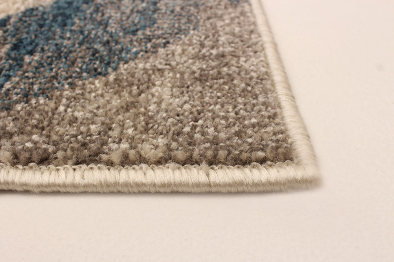 Korra Ivory / Blue 6'7\" x 9'6\" Area Rug