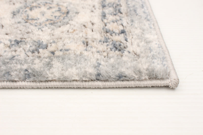 Octavian Tabriz Blue-Ivory Area Rug - 3'11\" x 5'11\"