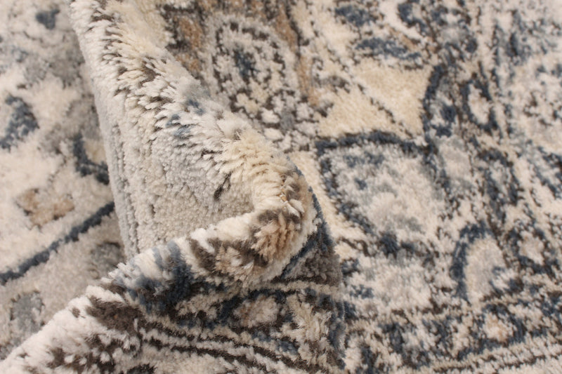 Octavian Tabriz Blue-Ivory Area Rug - 3'11\" x 5'11\"