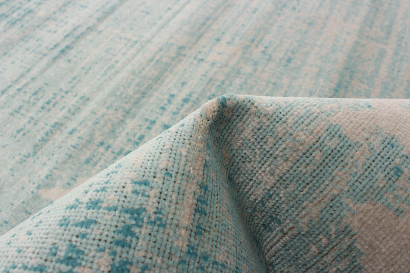Janaki Teal 6'7\" x 9'6\" Area Rug