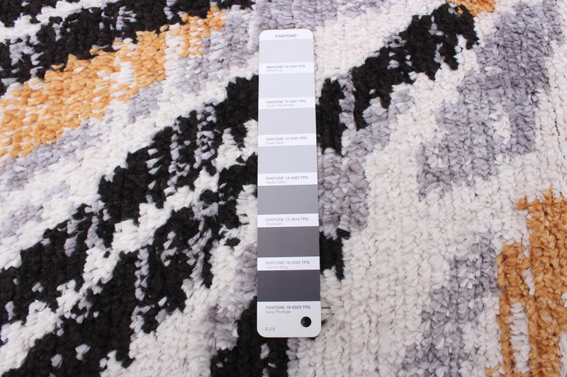 Paloma Sunburst Black, White Area Rug - 6'7\" x 9'6”
