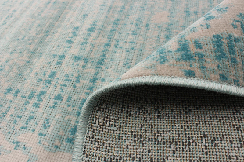 Janaki Teal 6'7\" x 9'6\" Area Rug