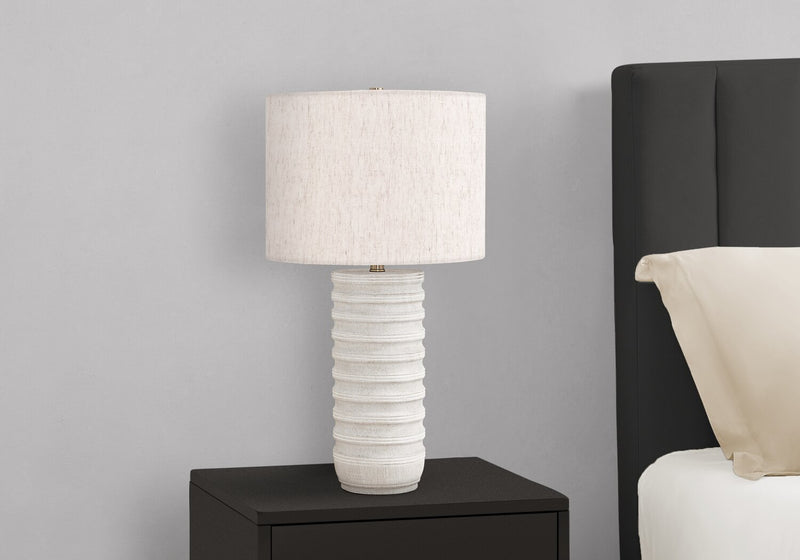 28\" Cream Textured Resin Table Lamp with Ivory Shade